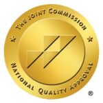 A gold seal that says the joint commission national quality approval.